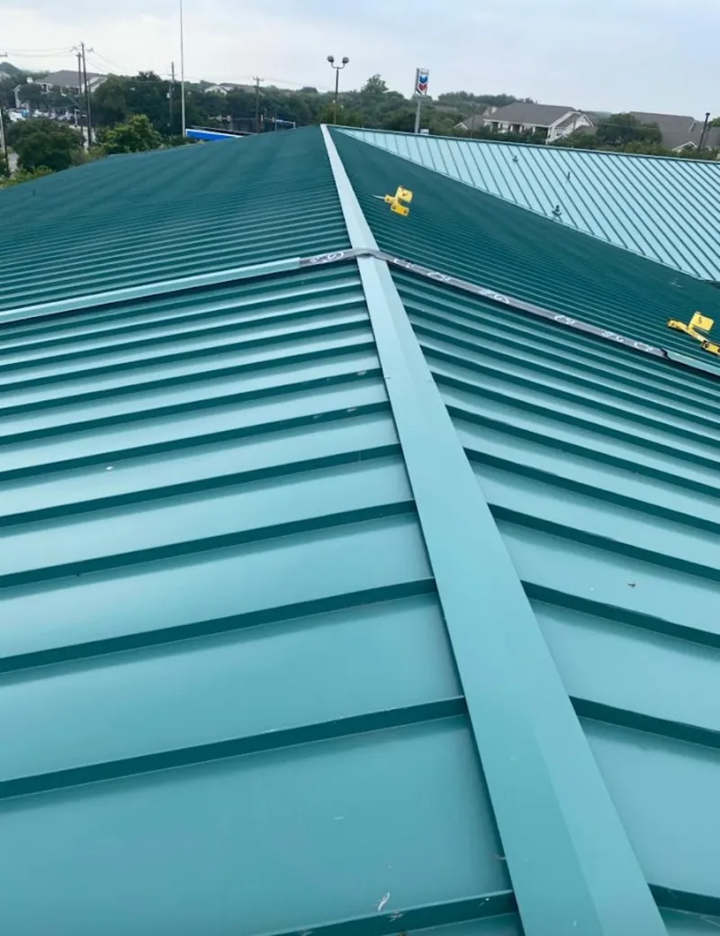 Green commercial metal roof ridge and valley for Metal Roof Repair in Richmond